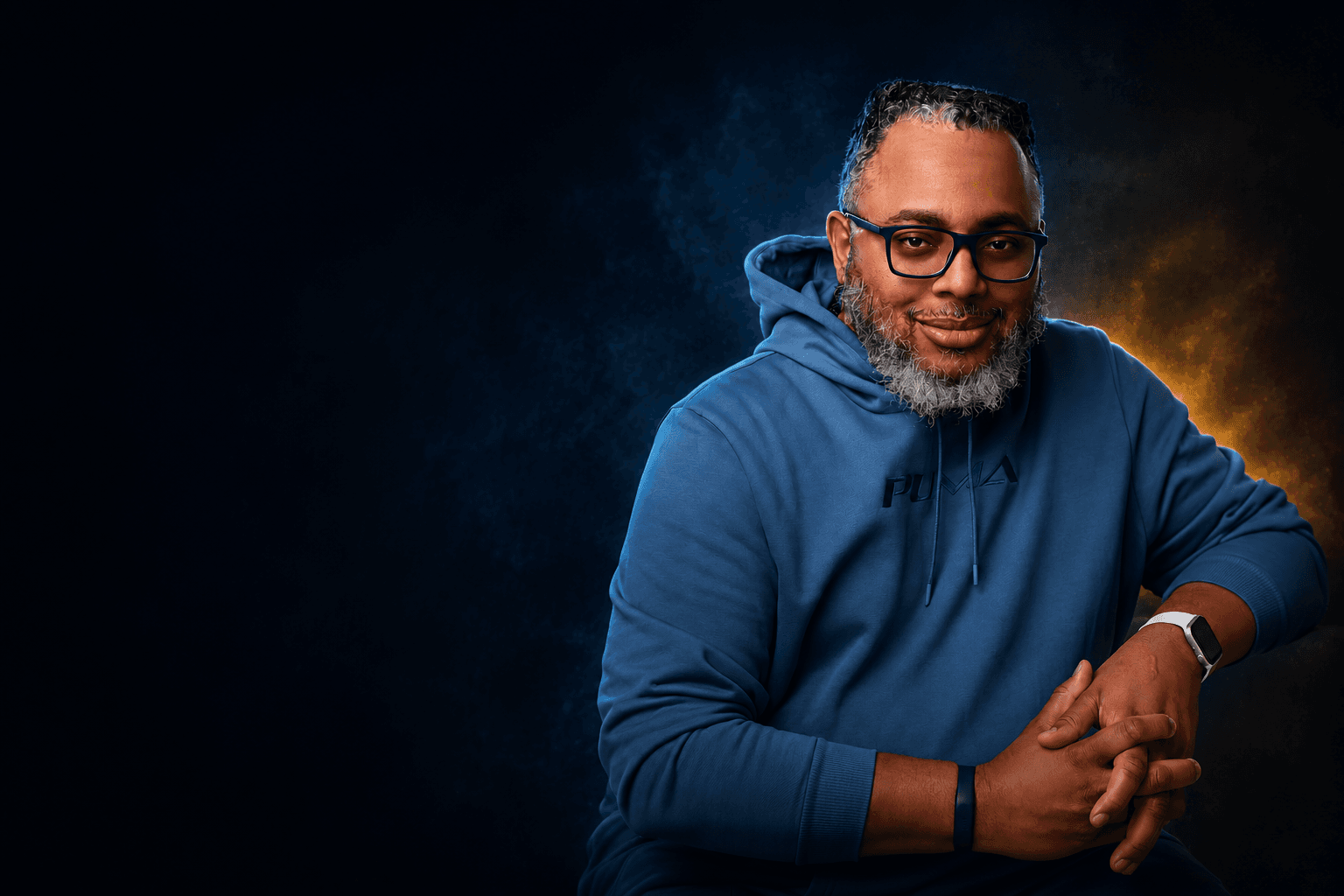 Portrait of B Donald Harris against a dark cyan and amber editorial background.